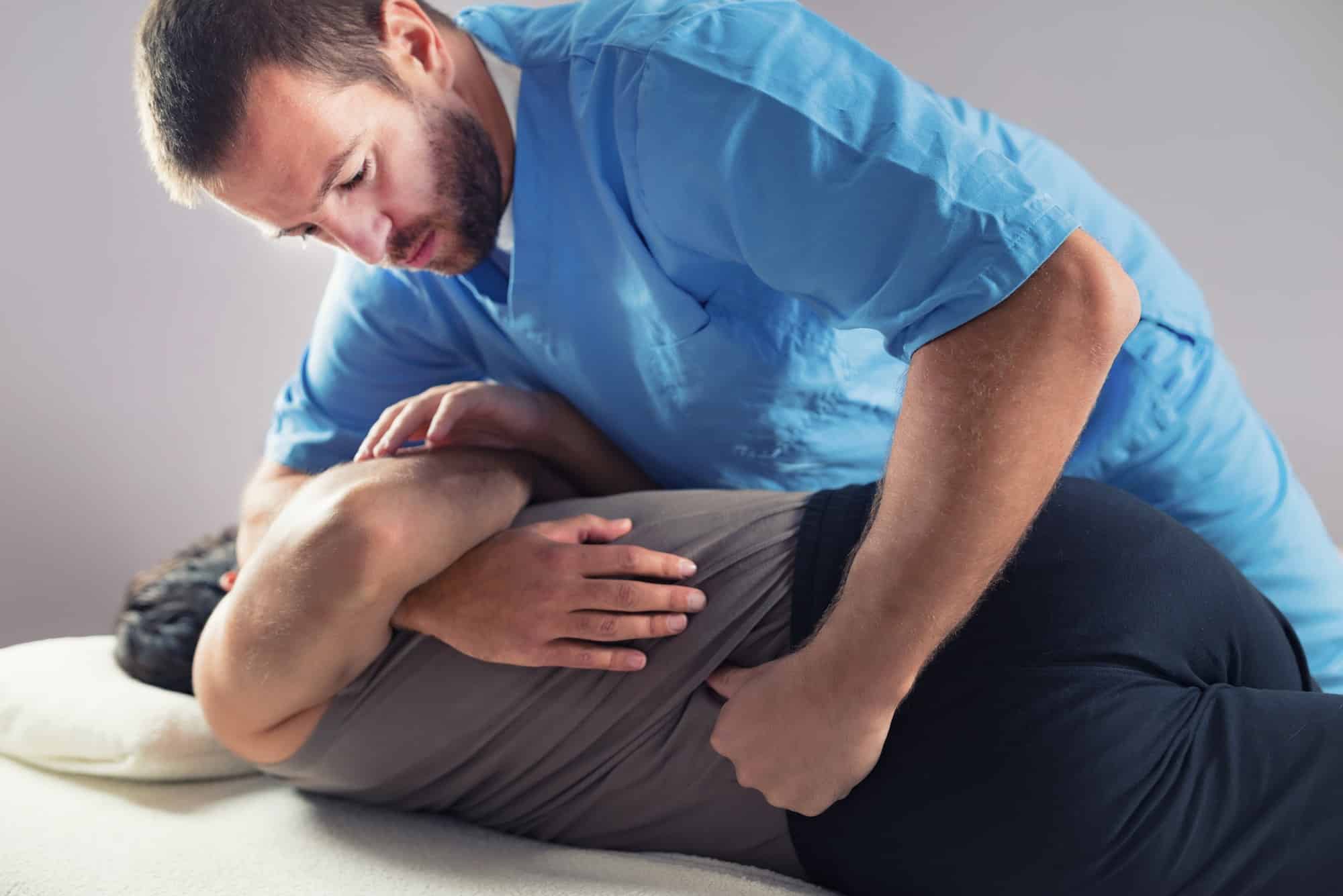 Chiropractor alleviating pain auto accident injury